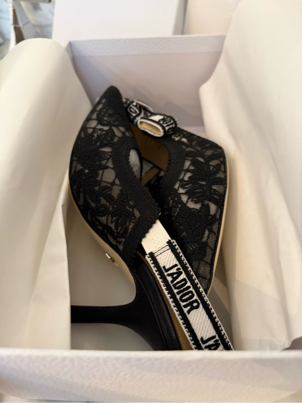 J'Adior slingback pump with black millefiori motif .